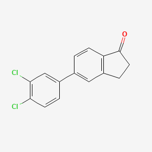 molecular formula C15H10Cl2O B8015867 5-(3,4-Dichlorophenyl)-2,3-dihydro-1H-inden-1-one 