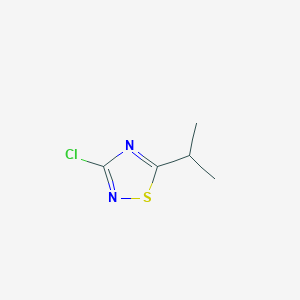 molecular formula C5H7ClN2S B8016934 3-Chloro-5-(propan-2-yl)-1,2,4-thiadiazole 