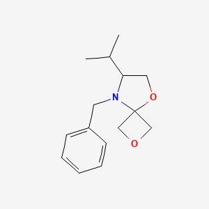 molecular formula C15H21NO2 B8017804 8-Benzyl-7-isopropyl-2,5-dioxa-8-azaspiro[3.4]octane 