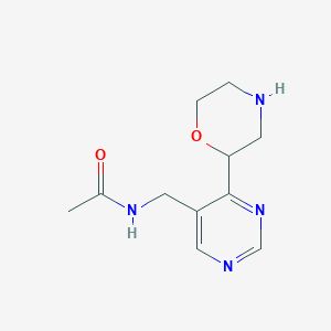 molecular formula C11H16N4O2 B8021794 N-{[4-(Morpholin-2-YL)pyrimidin-5-YL]methyl}acetamide 