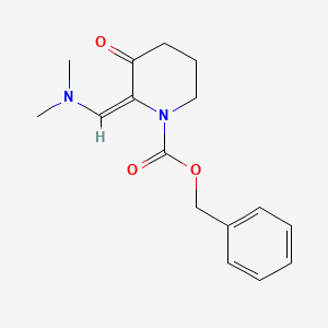 molecular formula C16H20N2O3 B8027760 2-Dimethylaminomethylene-3-oxo-piperidine-1-carboxylic acid benzyl ester 
