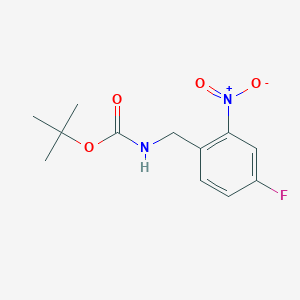 molecular formula C12H15FN2O4 B8030914 Tert-butyl N-[(4-fluoro-2-nitrophenyl)methyl]carbamate 