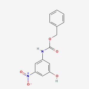 molecular formula C14H12N2O5 B8034350 Benzyl N-(3-hydroxy-5-nitrophenyl)carbamate 