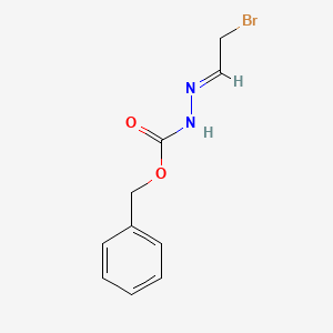 molecular formula C10H11BrN2O2 B8038522 Benzyl 2-(2-bromoethylidene)hydrazinecarboxylate 