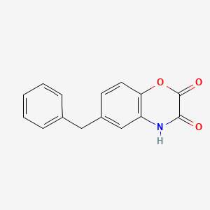 molecular formula C15H11NO3 B8041551 6-benzyl-4H-1,4-benzoxazine-2,3-dione 