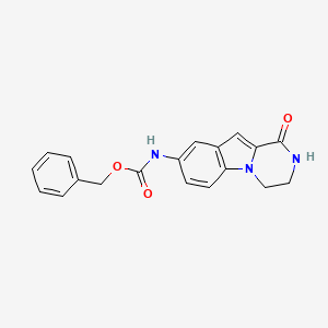 molecular formula C19H17N3O3 B8044950 benzyl N-(1-oxo-3,4-dihydro-2H-pyrazino[1,2-a]indol-8-yl)carbamate 