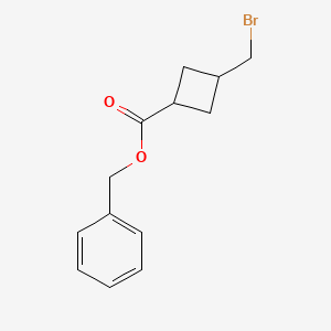 molecular formula C13H15BrO2 B8045059 Benzyl 3-(bromomethyl)cyclobutanecarboxylate 