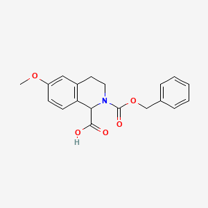 molecular formula C19H19NO5 B8046813 2-Cbz-6-methoxy-3,4-dihydro-1H-isoquinoline-1-carboxylic acid 