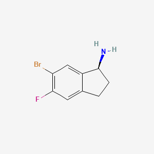 molecular formula C9H9BrFN B8048430 (1S)-6-Bromo-5-fluoroindanylamine 