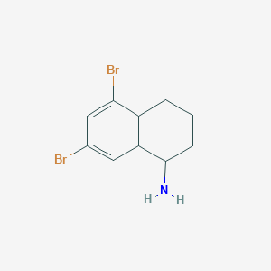 molecular formula C10H11Br2N B8048470 5,7-Dibromo-1,2,3,4-tetrahydronaphthalen-1-amine 