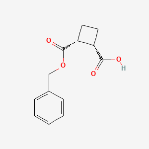 molecular formula C13H14O4 B8049638 (1S,2R)-2-((benzyloxy)carbonyl)cyclobutane-1-carboxylic acid 