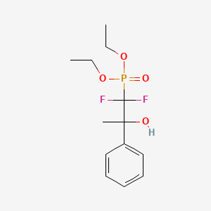 molecular formula C13H19F2O4P B8049751 1,1-Difluoro-2-hydroxy-2-phenylpropylphosphonic acid diethyl ester 