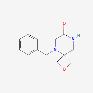 molecular formula C13H16N2O2 B8050473 5-Benzyl-2-oxa-5,8-diazaspiro[3.5]nonan-7-one 