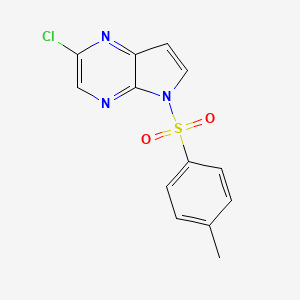 molecular formula C13H10ClN3O2S B8052892 2-Chloro-5-tosyl-5H-pyrrolo[2,3-b]pyrazine 