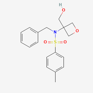 molecular formula C18H21NO4S B8054375 N-苄基-N-(3-(羟甲基)氧杂环-3-基)-4-甲基苯磺酰胺 
