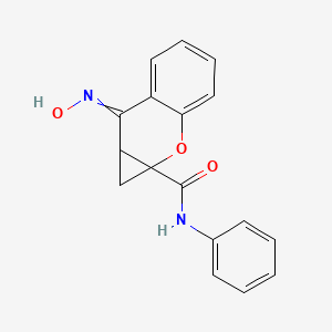 molecular formula C17H14N2O3 B8056230 7-hydroxyimino-N-phenyl-1,7a-dihydrocyclopropa[b][1]benzopyran-1a-carboxamide 