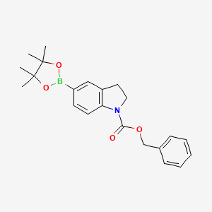 molecular formula C22H26BNO4 B8066995 5-(4,4,5,5-Tetramethyl-[1,3,2]dioxaborolane-2-yl)-2,3-dihydroindole-1-carboxylic acid benzyl ester 