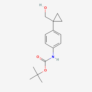 molecular formula C15H21NO3 B8068512 tert-butyl N-{4-[1-(hydroxymethyl)cyclopropyl]phenyl}carbamate 