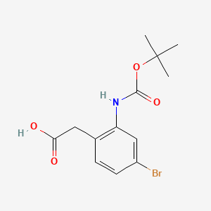 molecular formula C13H16BrNO4 B8068576 2-(4-Bromo-2-{[(tert-butoxy)carbonyl]amino}phenyl)acetic acid 