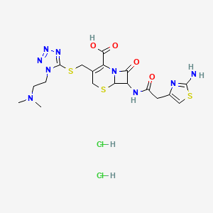 molecular formula C18H25Cl2N9O4S3 B8070209 (6R,7R)-7-[[2-(2-amino-1,3-thiazol-4-yl)acetyl]amino]-3-[[1-[2-(dimethylamino)ethyl]tetrazol-5-yl]sulfanylmethyl]-8-oxo-5-thia-1-azabicyclo[4.2.0]oct-2-ene-2-carboxylic acid;dihydrochloride 