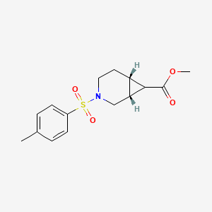 Methyl (1R,6S)-3-(4-methylphenyl)sulfonyl-3-azabicyclo[4.1.0]heptane-7-carboxylate
