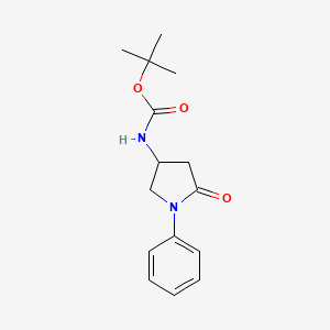 molecular formula C15H20N2O3 B8072922 tert-Butyl 5-oxo-1-phenylpyrrolidin-3-ylcarbamate 