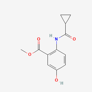 molecular formula C12H13NO4 B8074146 Methyl 2-(cyclopropanecarbonylamino)-5-hydroxybenzoate 