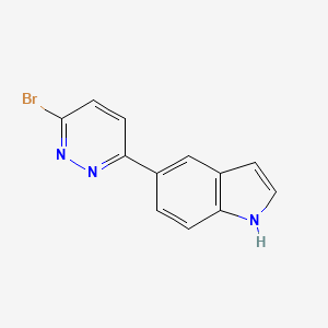 molecular formula C12H8BrN3 B8075822 5-(6-bromopyridazin-3-yl)-1H-indole 