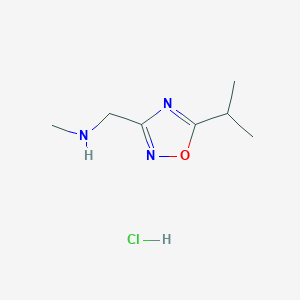 molecular formula C7H14ClN3O B8076177 1-(5-Isopropyl-1,2,4-oxadiazol-3-yl)-N-methylmethanamine hydrochloride 