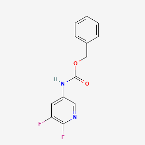 molecular formula C13H10F2N2O2 B8076834 Benzyl (5,6-difluoropyridin-3-yl)carbamate CAS No. 2007910-54-3