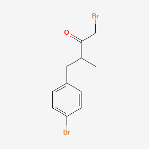 molecular formula C11H12Br2O B8077027 1-Bromo-4-(4-bromophenyl)-3-methylbutan-2-one CAS No. 2089651-66-9