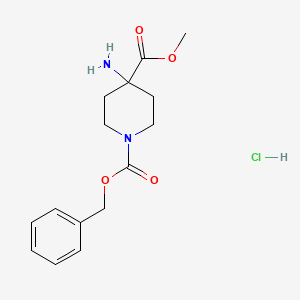 molecular formula C15H21ClN2O4 B8079582 1,4-Piperidinedicarboxylic acid, 4-amino-, 4-methyl 1-(phenylmethyl) ester, hydrochloride (1:1) 