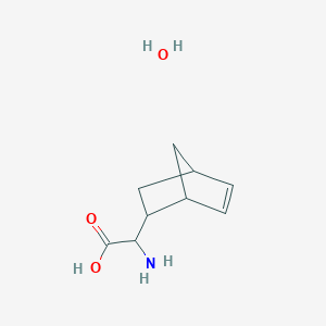 molecular formula C9H15NO3 B8087502 2-Amino-2-{bicyclo[2.2.1]hept-5-en-2-yl}acetic acid hydrate 