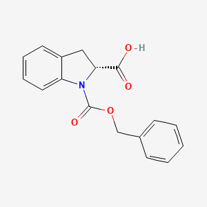 molecular formula C17H15NO4 B8088952 (2R)-1-[(benzyloxy)carbonyl]-2,3-dihydro-1H-indole-2-carboxylic acid 