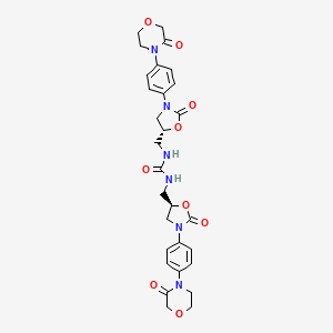 molecular formula C29H32N6O9 B8091058 1,3-bis(((R)-2-oxo-3-(4-(3-oxomorpholino)phenyl)oxazolidin-5-yl)methyl)urea 