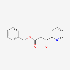 molecular formula C15H13NO3 B8098297 b-Oxo-2-pyridinepropanoic acid benzyl ester 