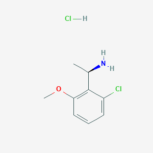 molecular formula C9H13Cl2NO B8098602 (R)-1-(2-Chloro-6-methoxyphenyl)ethan-1-amine hcl 