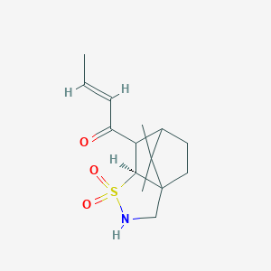 molecular formula C14H21NO3S B8099571 1-((7AS)-8,8-dimethyl-1,1-dioxidohexahydro-2H-3a,6-methanobenzo[d]isothiazol-7-yl)but-2-en-1-one 