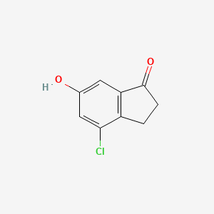 molecular formula C9H7ClO2 B8099843 4-Chloro-6-hydroxy-2,3-dihydro-1H-inden-1-one 