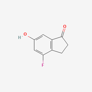 molecular formula C9H7FO2 B8100146 4-Fluoro-6-hydroxy-2,3-dihydro-1H-inden-1-one 