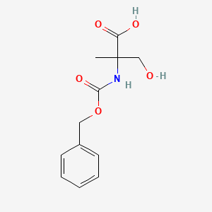 molecular formula C12H15NO5 B8101777 3-Hydroxy-2-methyl-2-(phenylmethoxycarbonylamino)propanoic acid 