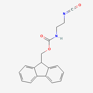 molecular formula C18H16N2O3 B8105044 (9H-fluoren-9-yl)methyl (2-isocyanatoethyl)carbamate 