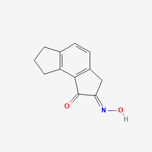 molecular formula C12H11NO2 B8105624 (E)-2-(hydroxyimino)-2,3,7,8-tetrahydro-as-indacen-1(6H)-one 
