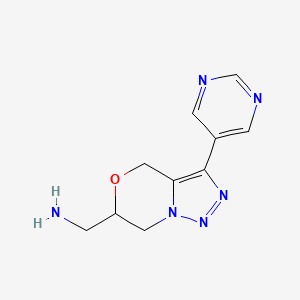 molecular formula C10H12N6O B8108874 (3-(Pyrimidin-5-yl)-6,7-dihydro-4H-[1,2,3]triazolo[5,1-c][1,4]oxazin-6-yl)methanamine 