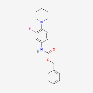 molecular formula C19H21FN2O2 B8112741 Benzyl (3-fluoro-4-(piperidin-1-yl)phenyl)carbamate 