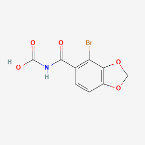 molecular formula C9H6BrNO5 B8119477 (4-Bromo-1,3-benzodioxole-5-carbonyl)carbamic acid 