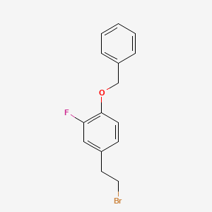molecular formula C15H14BrFO B8121195 1-Benzyloxy-4-(2-bromo-ethyl)-2-fluoro-benzene 