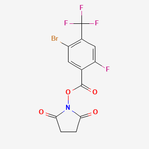molecular formula C12H6BrF4NO4 B8126506 2,5-Dioxopyrrolidin-1-yl 5-bromo-2-fluoro-4-(trifluoromethyl)benzoate 