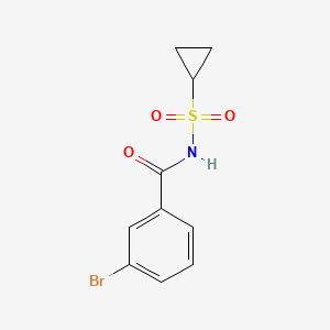 molecular formula C10H10BrNO3S B8126760 Cyclopropanesulfonic acid 3-bromobenzoylamide 