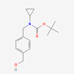 molecular formula C16H23NO3 B8126896 Cyclopropyl-(4-hydroxymethylbenzyl)-carbamic acid tert-butyl ester 